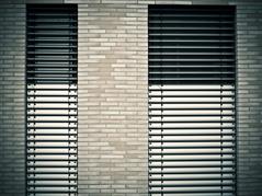 Picture of ouside sunblinds at a building.